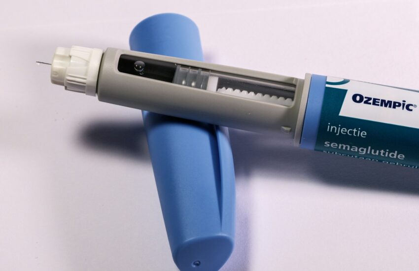 A blue and white medical device on a white surface